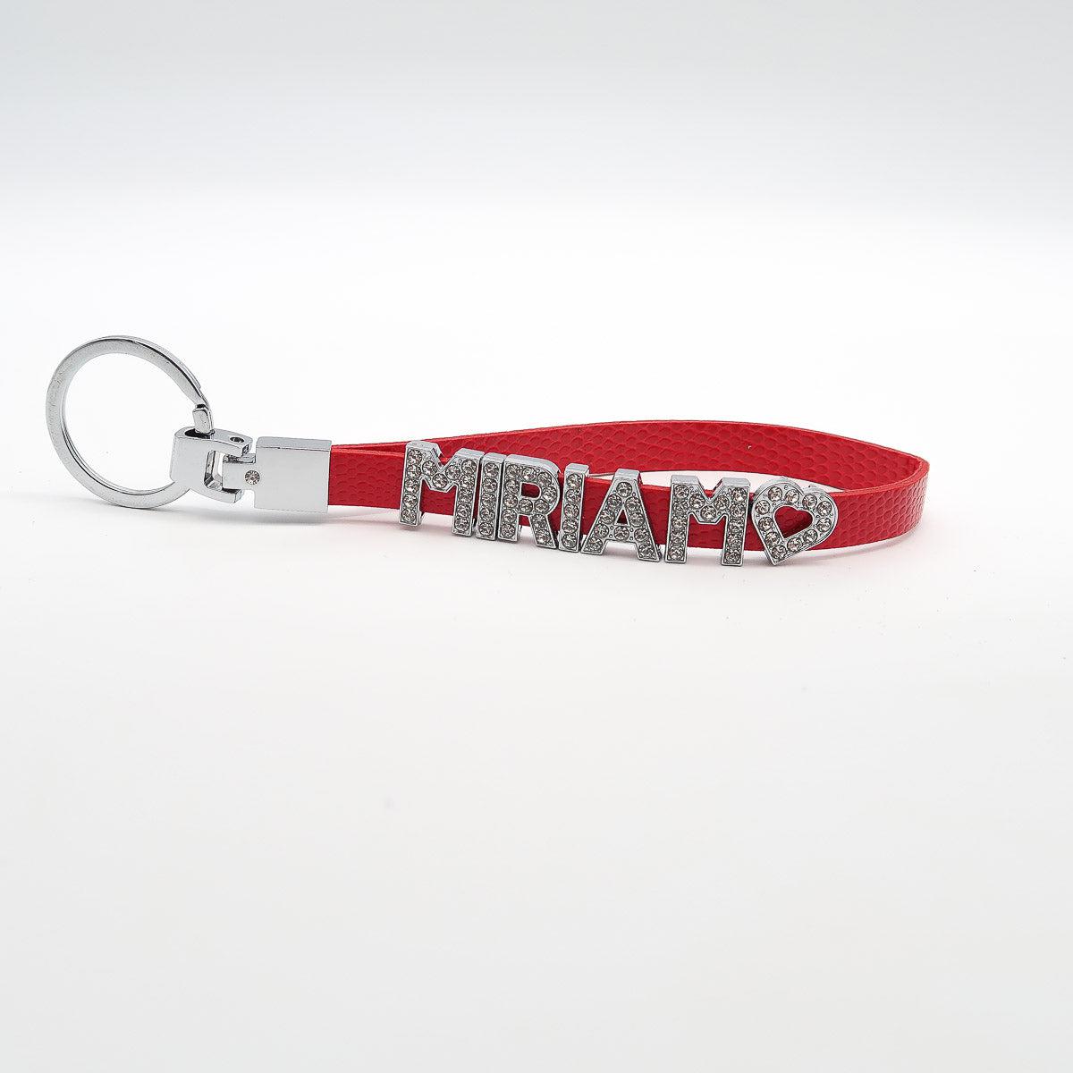 Gepersonaliseerde sleutelhanger "Bling Bling" met één letter voor de naam. Glamour voor de sleutel